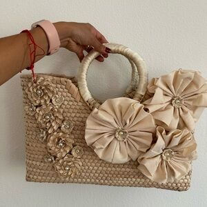 Cream and tan straw bag with floral details hand made in Mexico